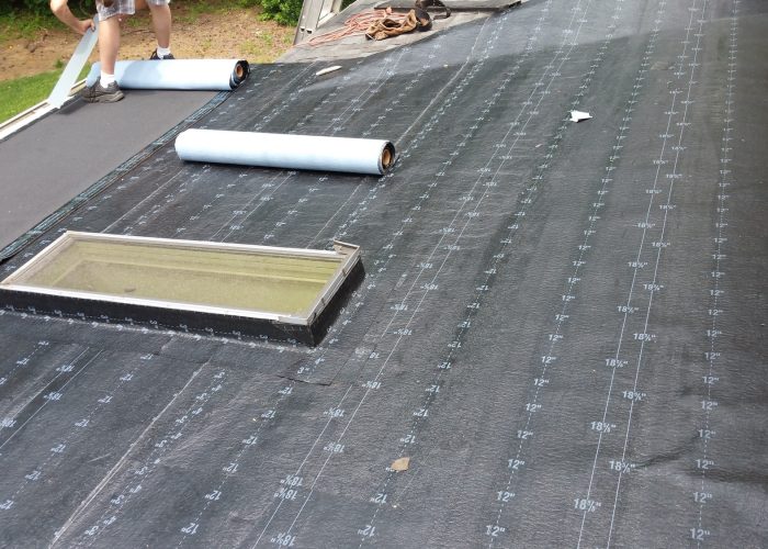 Installing Underlayment for new roof in Raleigh